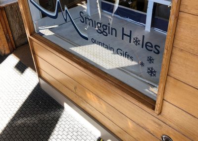 Retail Window Signage - Mountain Air Smiggain Holes